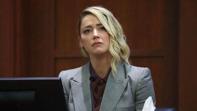 Amber Heard pas humbjes së gjyqit: Jam zemërthyer